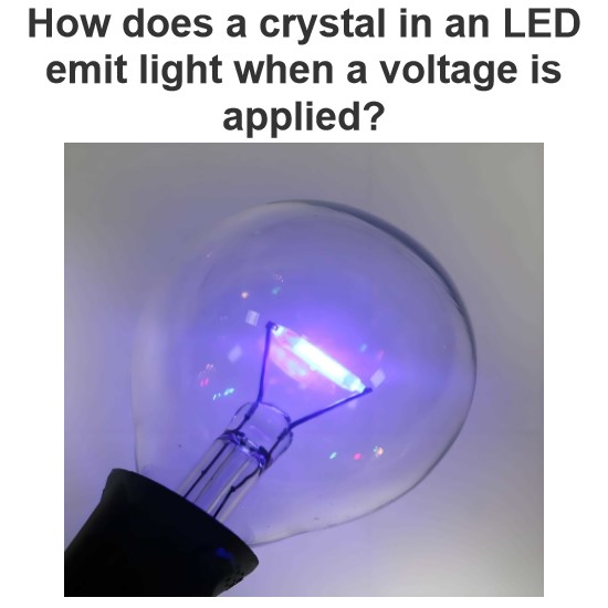 How does a crystal in an LED emit light when a voltage is applied?